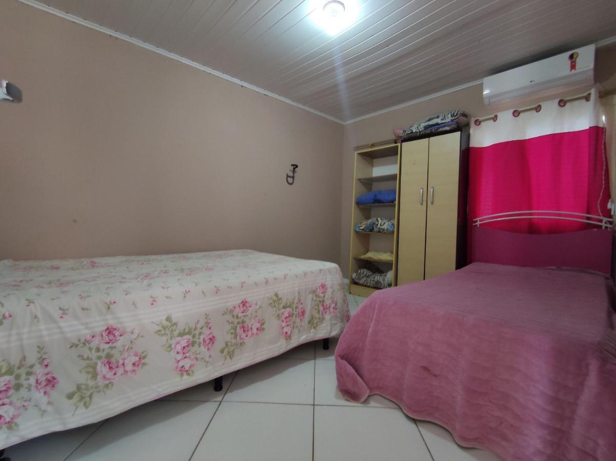 Casa a apenas 7 quadra da Praia da cal com ar e 2 dorm por Imóveis Alex Amaro Torres Exterior foto